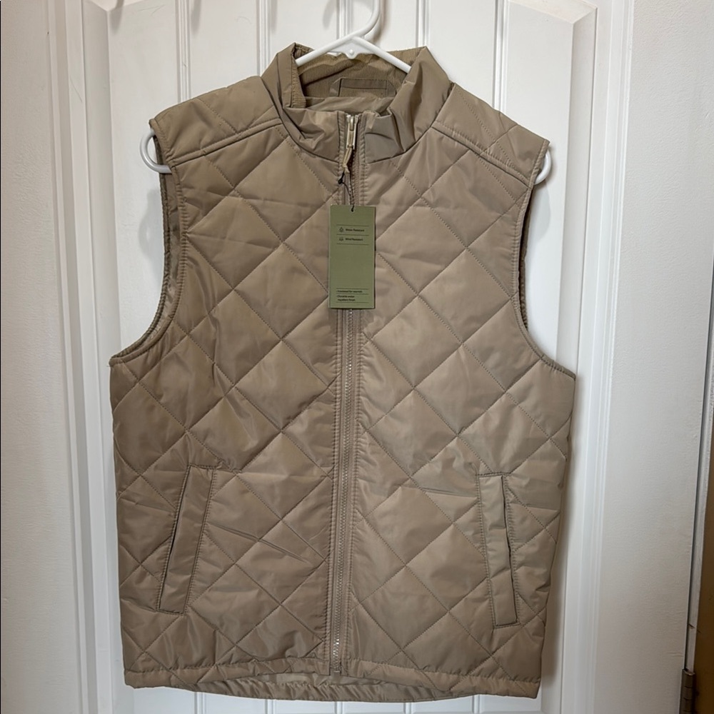 Men's Tan Quilted Vest. New with tags size small.